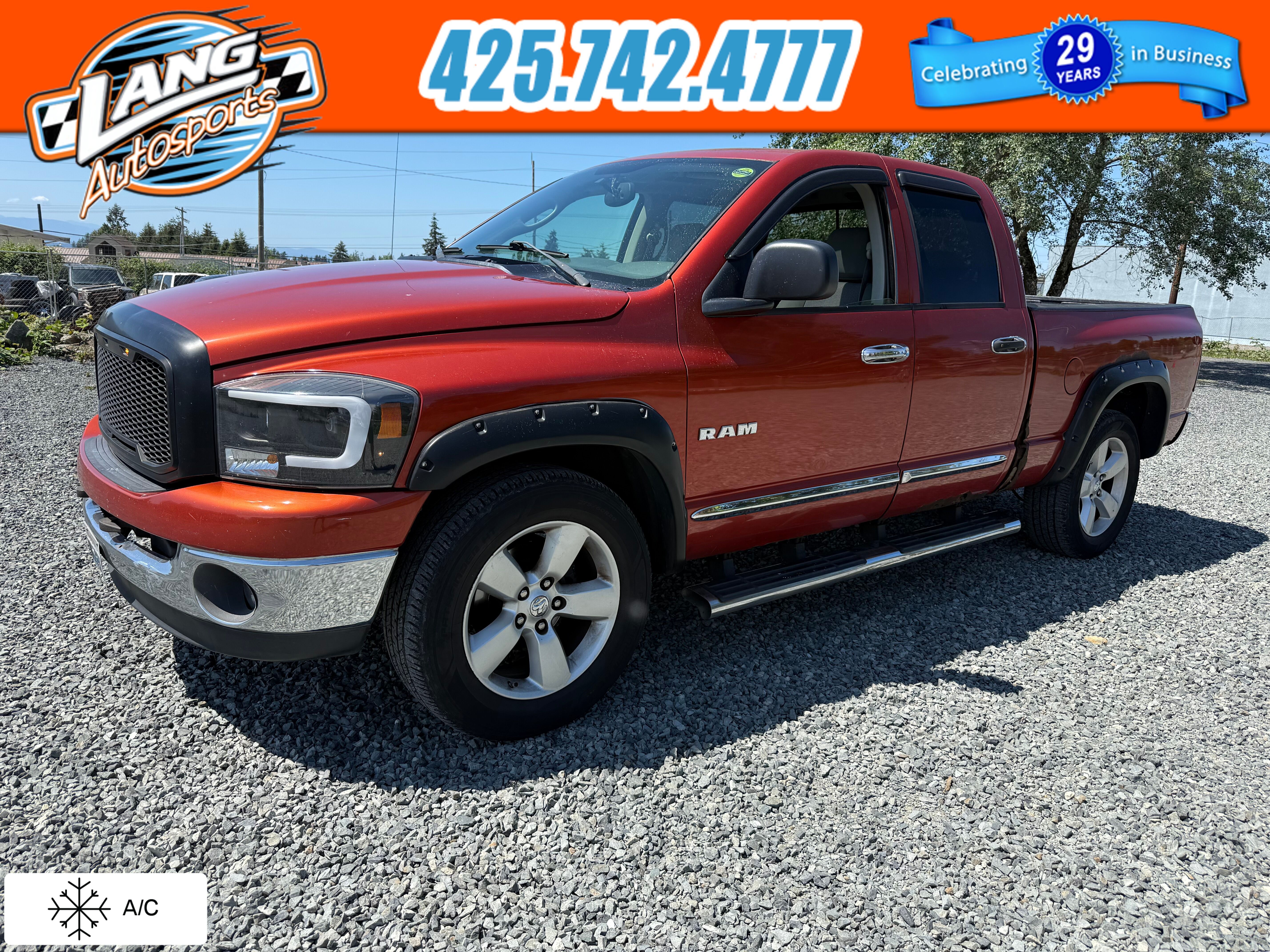 Orange 2008 Dodge RAM 1500 ST Quad Cab 4WD Pickup Truck Four-Wheel Drive 5-Speed Automatic