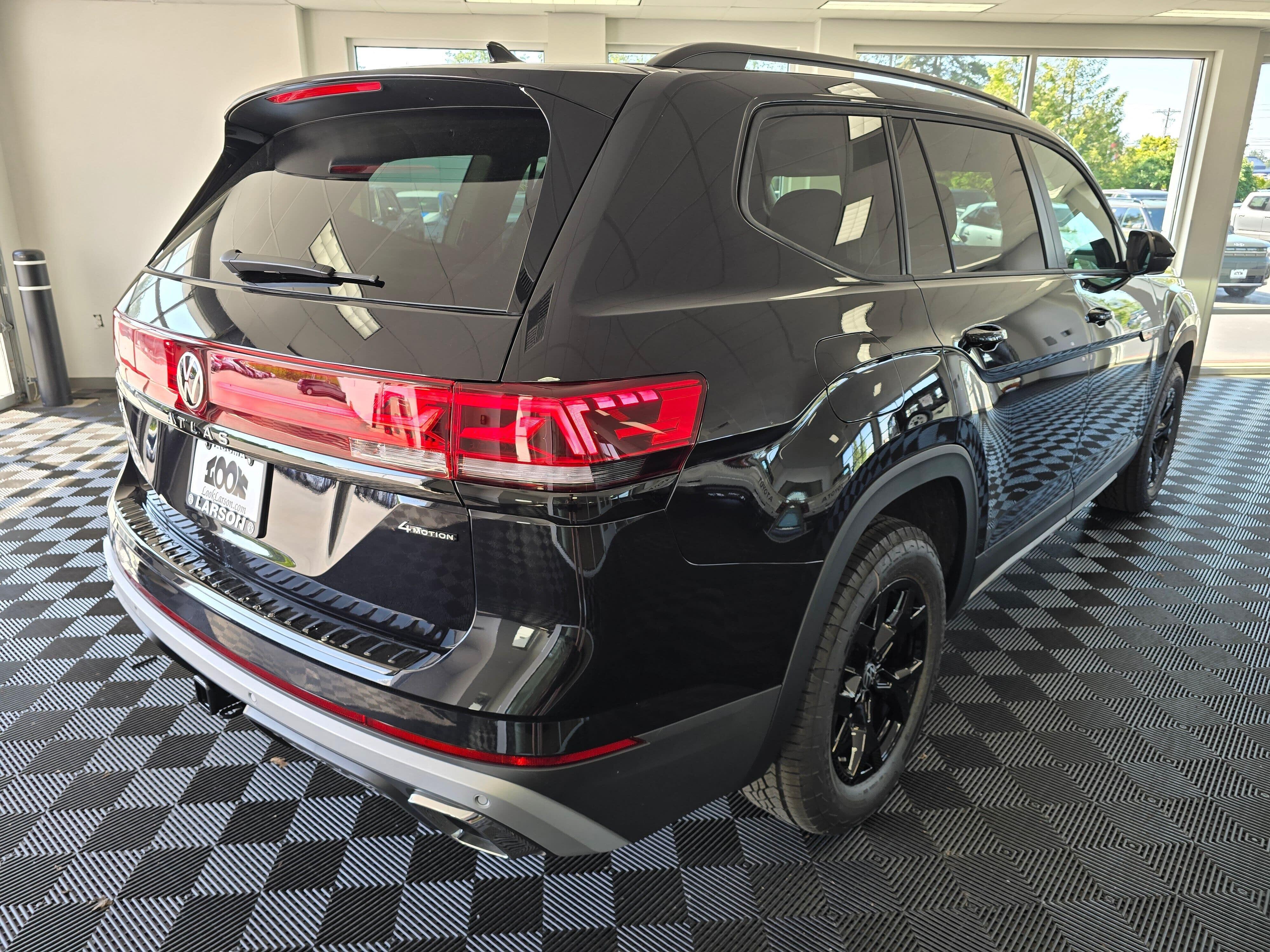 View vehicle photo 3